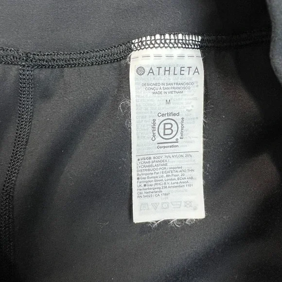 Athleta Elation Pants Women Medium Black Tapered Pleated Stretch Knit Athleisure - Picture 10 of 14